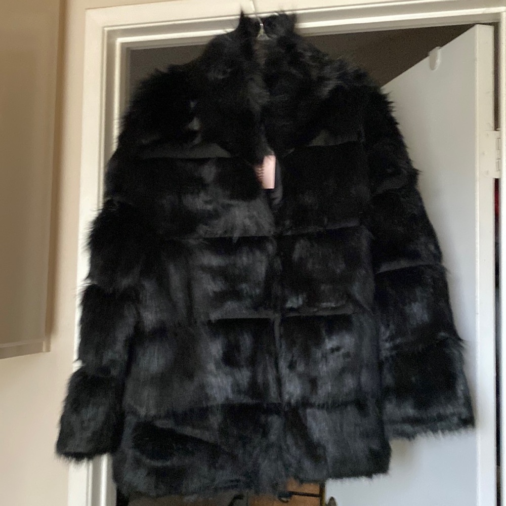 Faux fur coat with pockets